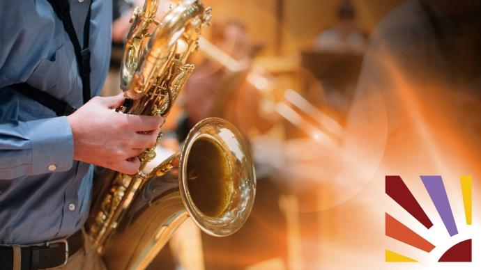 A close-up of a student playing the saxophone