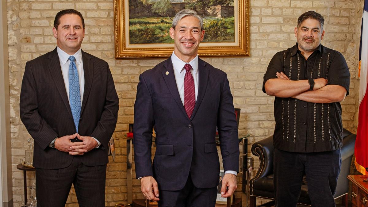 Manny Pelaez, Ron Nirenberg and Erik Walsh stand in office